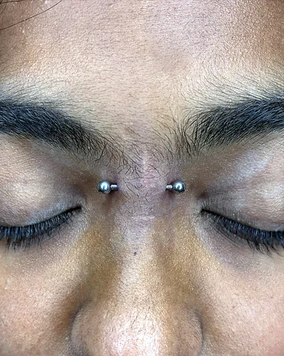 Bridge piercing, barbell at Rebel Tattoos, Sector 67 Gurgaon