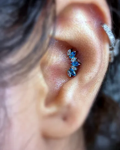 Conch piercing, blue marquise at Rebel Tattoos, Sector 67 Gurgaon