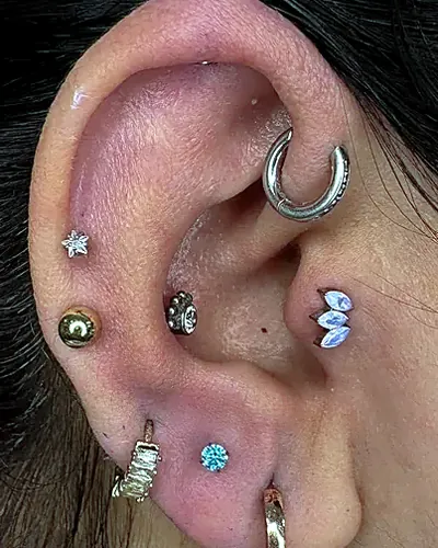 Curated ear piercing, full at Rebel Tattoos, Sector 67 Gurgaon