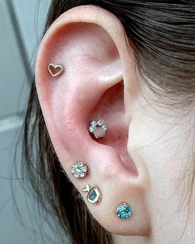 Curated ear piercing, heart at Rebel Tattoos, Sector 67 Gurgaon