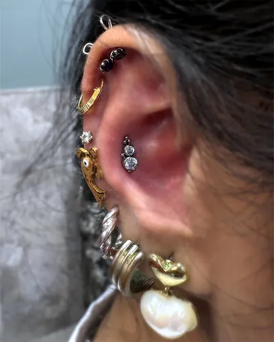 Curated ear piercing, with drop at Rebel Tattoos, Sector 67 Gurgaon