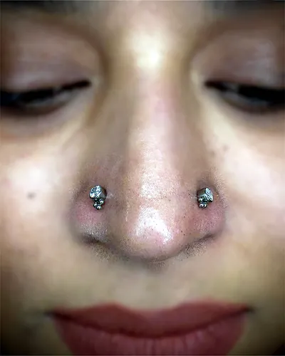 Double nostril piercing, studs at Rebel Tattoos, Sector 67 Gurgaon