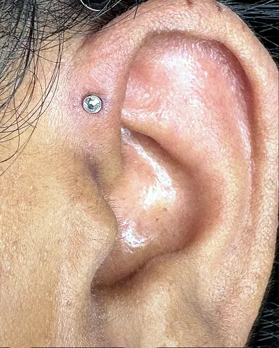 Forward helix piercing, crystal stud at Rebel Tattoos, Sector 67 Gurgaon
