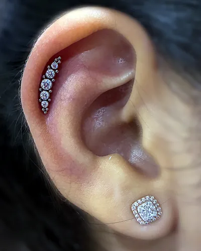 Helix piercing, cubic zirconia climber at Rebel Tattoos, Sector 67 Gurgaon