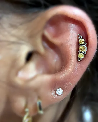 Helix piercing, opal cluster at Rebel Tattoos, Sector 67 Gurgaon