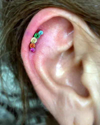 Helix piercing, rainbow cluster at Rebel Tattoos, Sector 67 Gurgaon