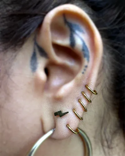 Helix piercing, triple hoops at Rebel Tattoos, Sector 67 Gurgaon