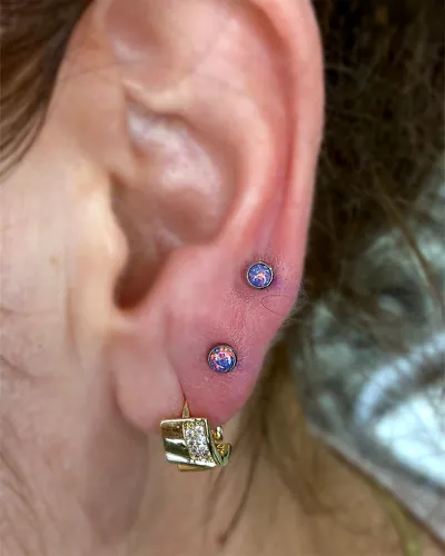 Stacked lobes piercing, opal at Rebel Tattoos, Sector 67 Gurgaon