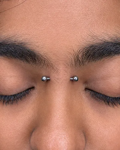 Bridge piercing, barbell at Rebel Tattoos, Sector 67 Gurgaon
