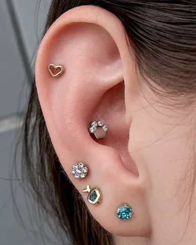 Curated ear piercing, heart at Rebel Tattoos, Sector 67 Gurgaon