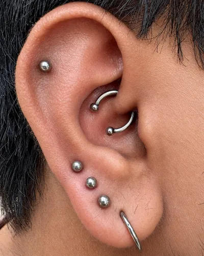 Daith, helix and upper lobe piercings at Rebel Tattoos, Sector 67 Gurgaon