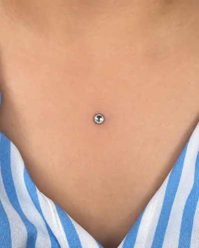 Dermal piercing, sternum at Rebel Tattoos, Sector 67 Gurgaon