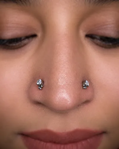 Double nostril piercing, studs at Rebel Tattoos, Sector 67 Gurgaon