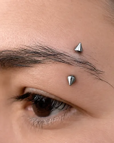 Eyebrow piercing, spike barbell at Rebel Tattoos, Sector 67 Gurgaon