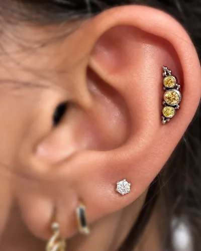 Helix piercing, opal cluster at Rebel Tattoos, Sector 67 Gurgaon