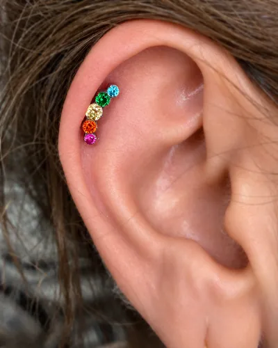 Helix piercing, rainbow cluster at Rebel Tattoos, Sector 67 Gurgaon