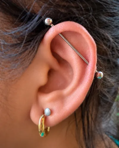 Industrial barbell with an opal helix at Rebel Tattoos, Sector 67 Gurgaon