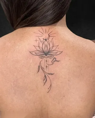 Lotus Mandala, fine line tattoo on the upper back, single needle, at Rebel Tattoos, Sector 67 Gurgaon