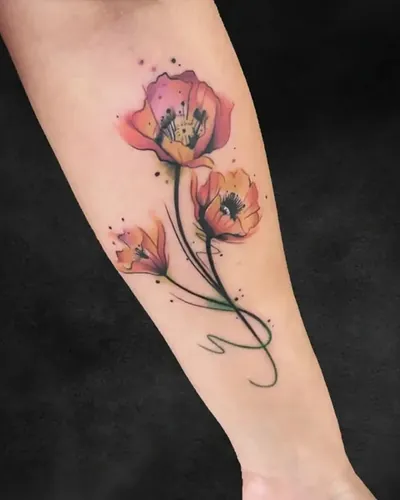 Poppies, floral tattoo on the forearm, colour, at Rebel Tattoos, Sector 67 Gurgaon