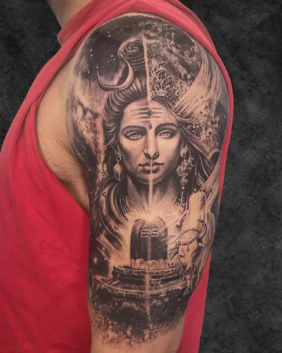 Ardhanareeshwara, devotional realism tattoo on the upper arm, black and grey, at Rebel Tattoos, Sector 67 Gurgaon