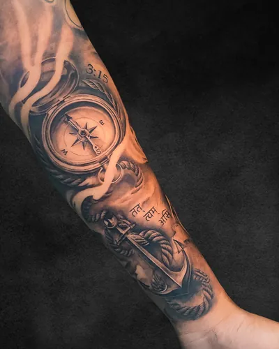 Compass and Skull, realism tattoo on the inner forearm, black and grey, at Rebel Tattoos, Sector 67 Gurgaon
