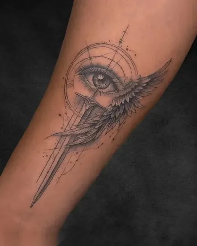 Eye and Wing, illustrative tattoo on the forearm, black and grey, at Rebel Tattoos, Sector 67 Gurgaon