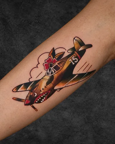 Fighter Plane, traditional colour tattoo on the inner forearm, full colour, at Rebel Tattoos, Sector 67 Gurgaon