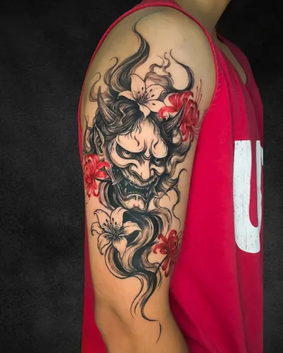 Hanya Mask, japanese tattoo on the upper arm, black, grey and red, at Rebel Tattoos, Sector 67 Gurgaon