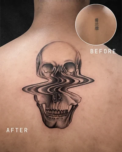 Melting Skull, cover-up tattoo on the upper back, black and grey, at Rebel Tattoos, Sector 67 Gurgaon