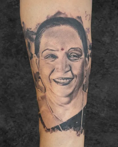 Mother Portrait, portrait realism tattoo on the forearm, black and grey, at Rebel Tattoos, Sector 67 Gurgaon