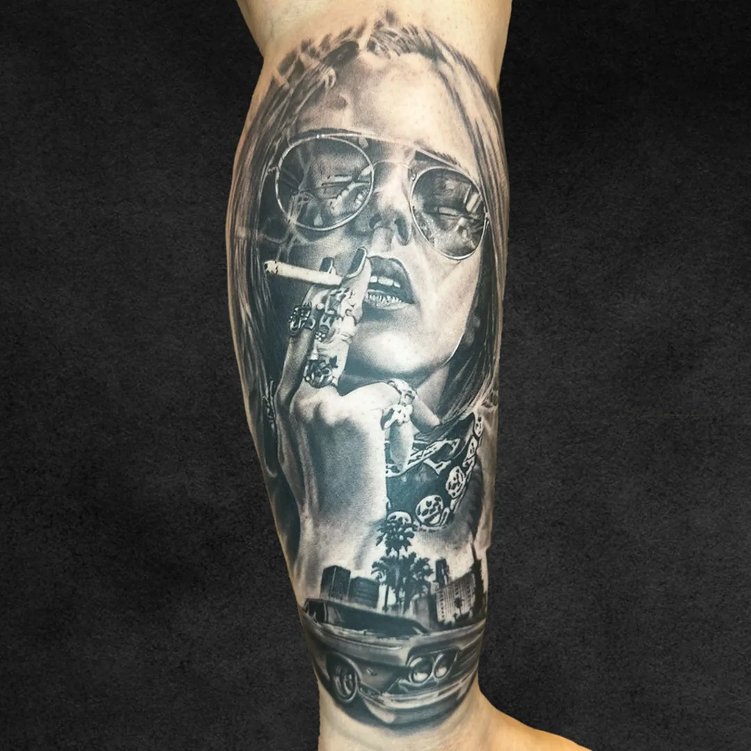 Chicano style sunglasses and smoke black and grey sleeve at Rebel Tattoos Gurgaon